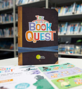 The Secret Book Quest booklet, library cards in a Libraries Unlimited library