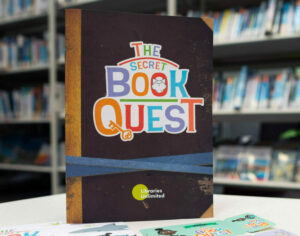 The Secret Book Quest booklet, library cards in a Libraries Unlimited library